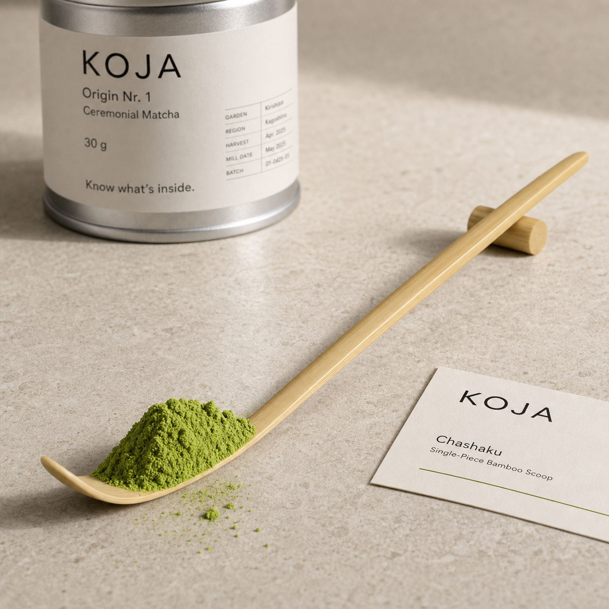 KOJA chashaku bamboo matcha scoop with light premium matcha powder and silver KOJA tin